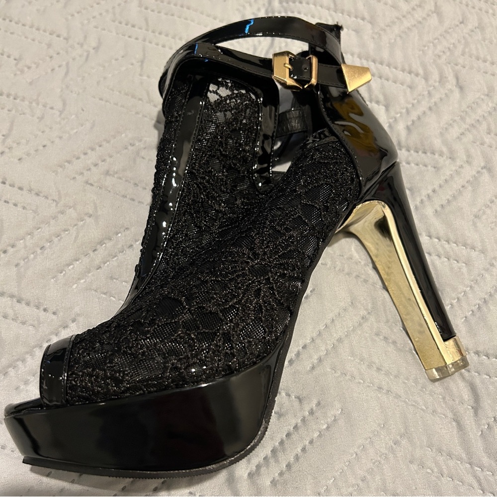 Elegant Black Lace Heels with Gold Accents